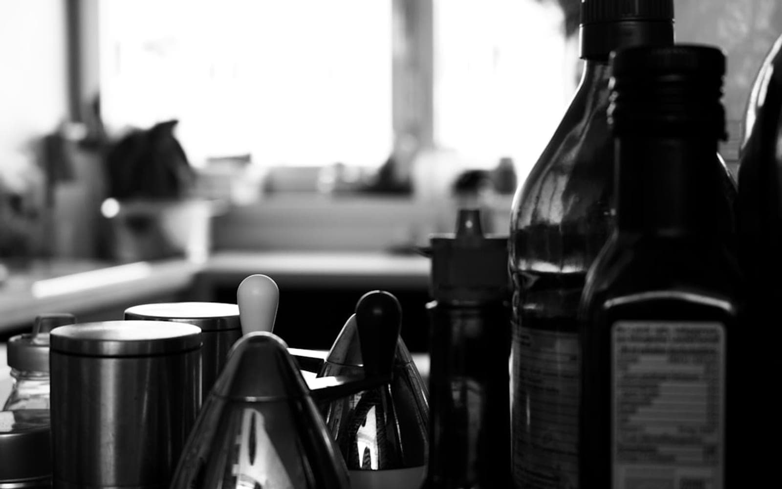 black and white photograph of a kitchen counter