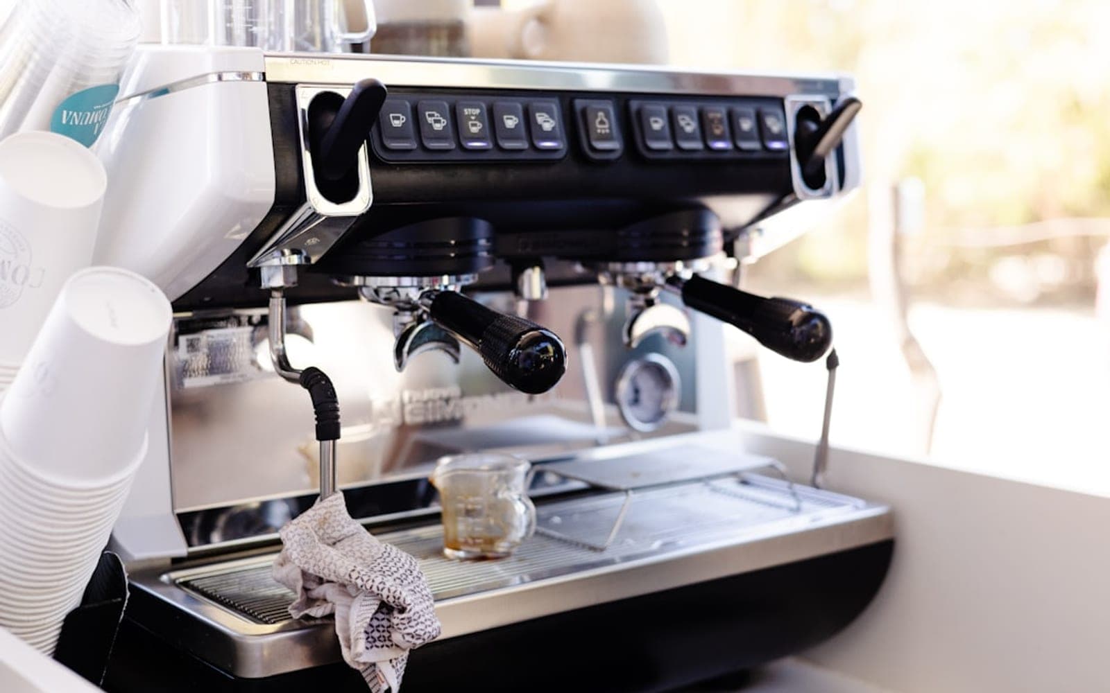 a close up of a coffee machine on a table